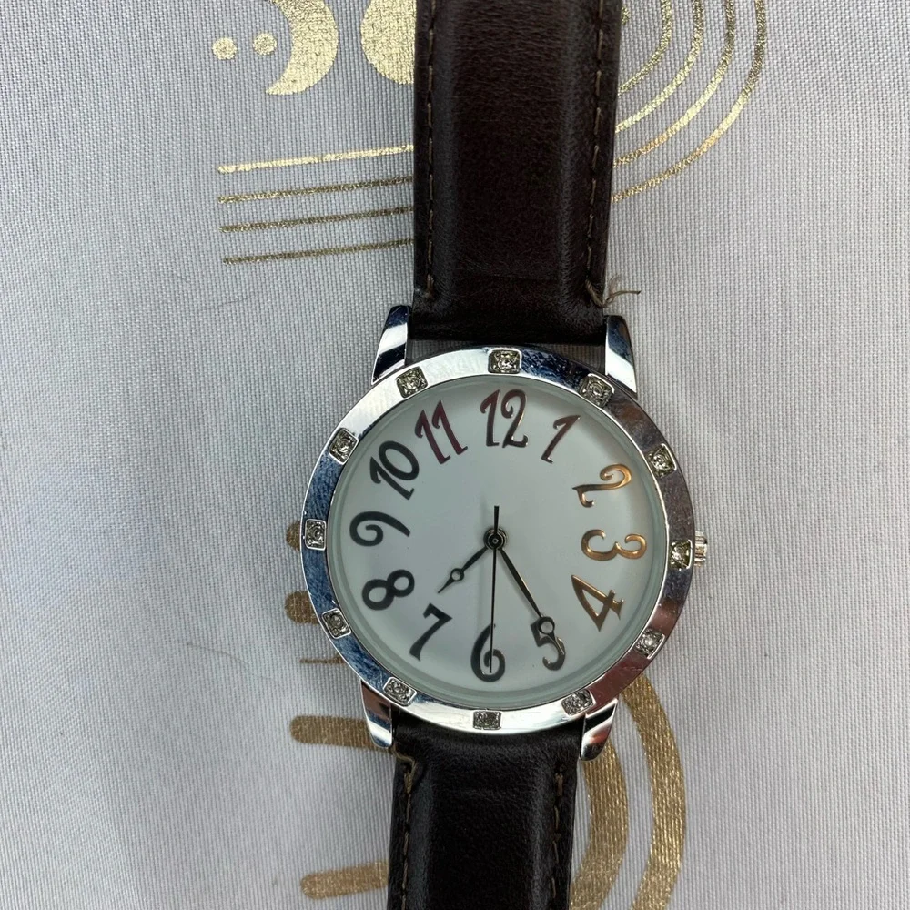 Silver and Brown Watch with Unique Numerals